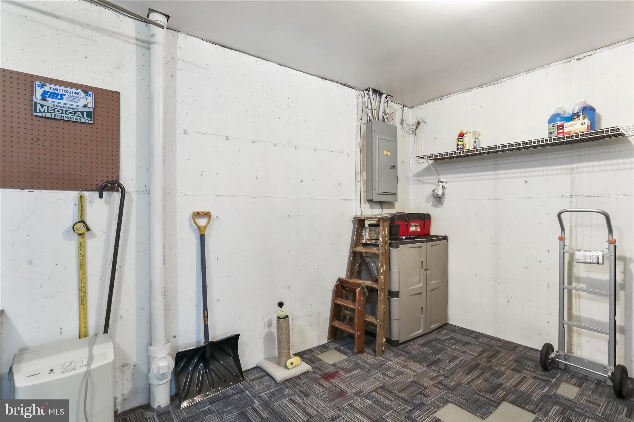 60 Morningside Drive Falling Waters, WV 25419 - Photo 35 of 45 a view of storage and utility room with two washing machine