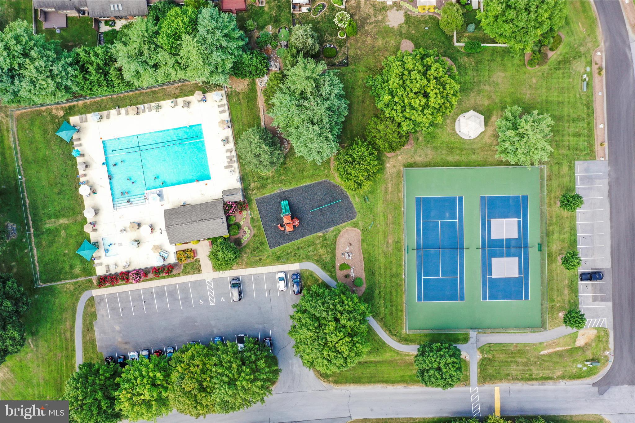 60 Morningside Drive Falling Waters, WV 25419 - Photo 42 of 45 an aerial view of a house with a yard and potted plants