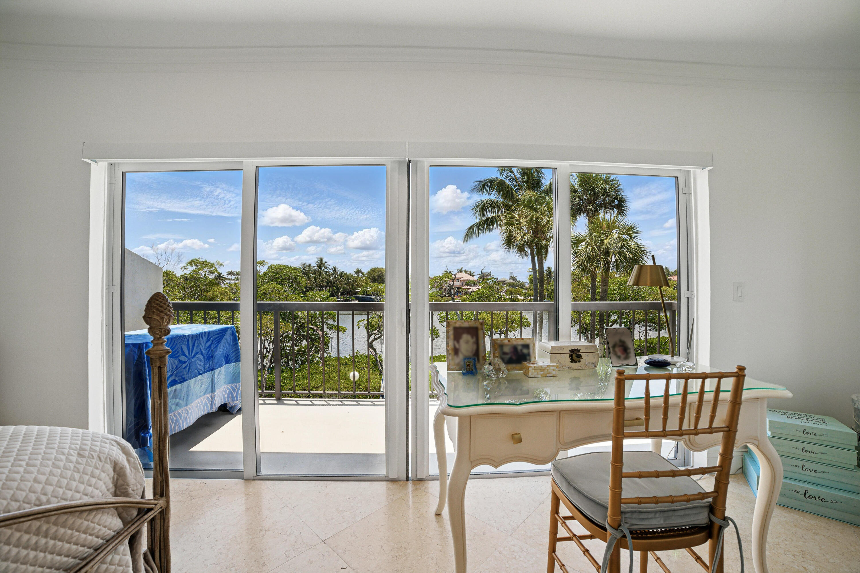 3474 South Ocean Boulevard, Unit 14 Palm Beach, FL 33480 - Photo 24 of 64 a dining room with furniture water view and a floor to ceiling window