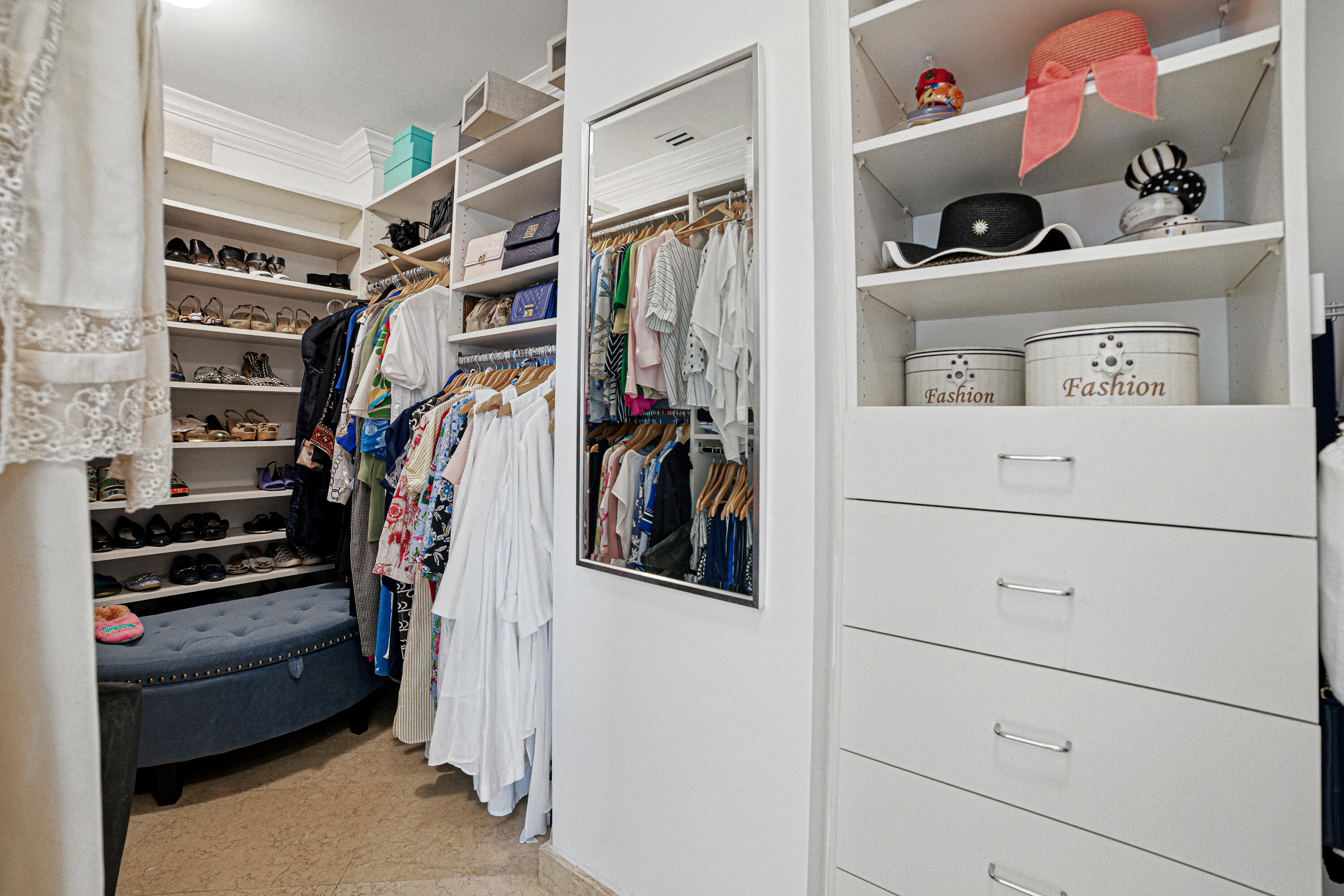 3474 South Ocean Boulevard, Unit 14 Palm Beach, FL 33480 - Photo 29 of 64 a view of walk in closet with clothes and shoes