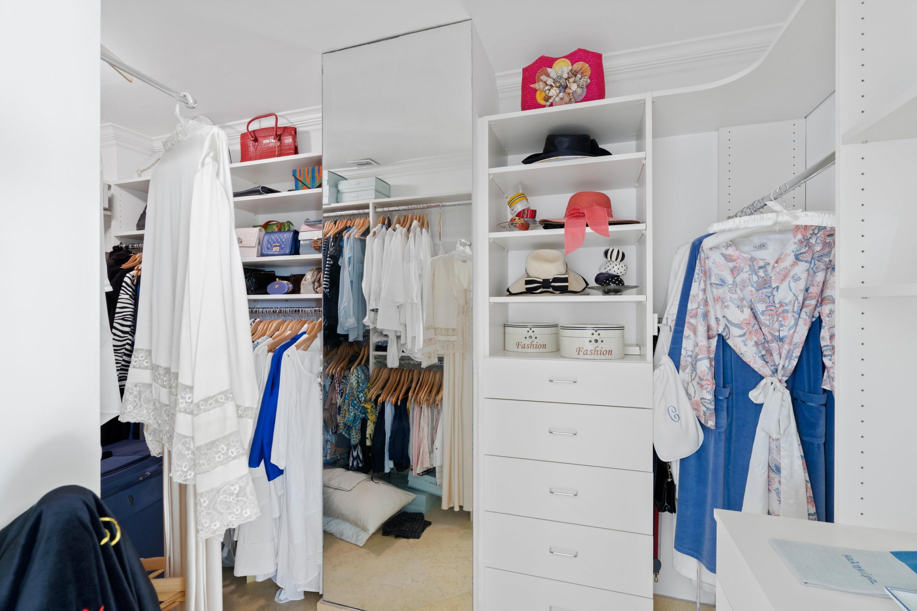 3474 South Ocean Boulevard, Unit 14 Palm Beach, FL 33480 - Photo 30 of 64 a view of walk in closet with clothes shoes and a closet