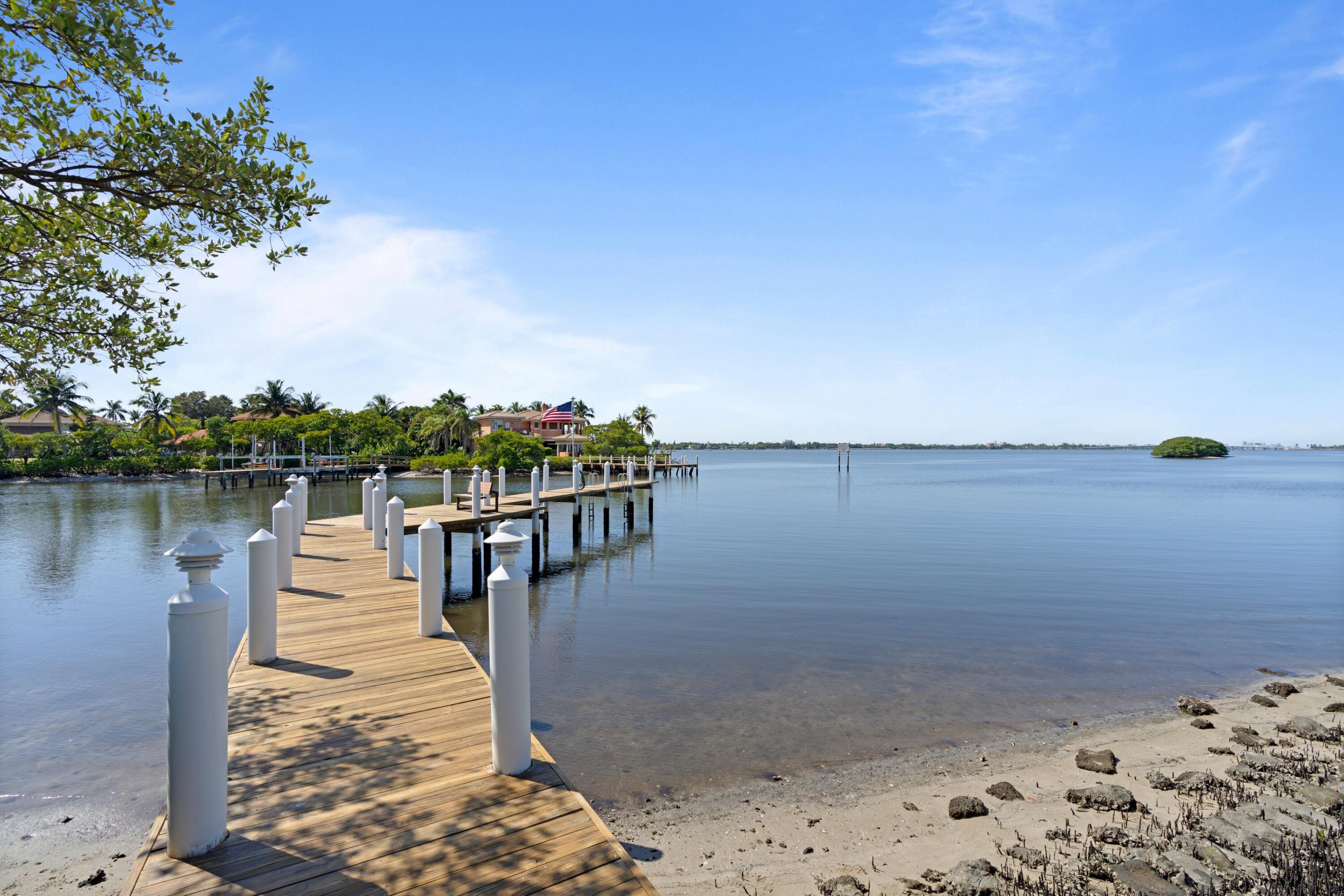 3474 South Ocean Boulevard, Unit 14 Palm Beach, FL 33480 - Photo 61 of 64 a view of a lake with a trees