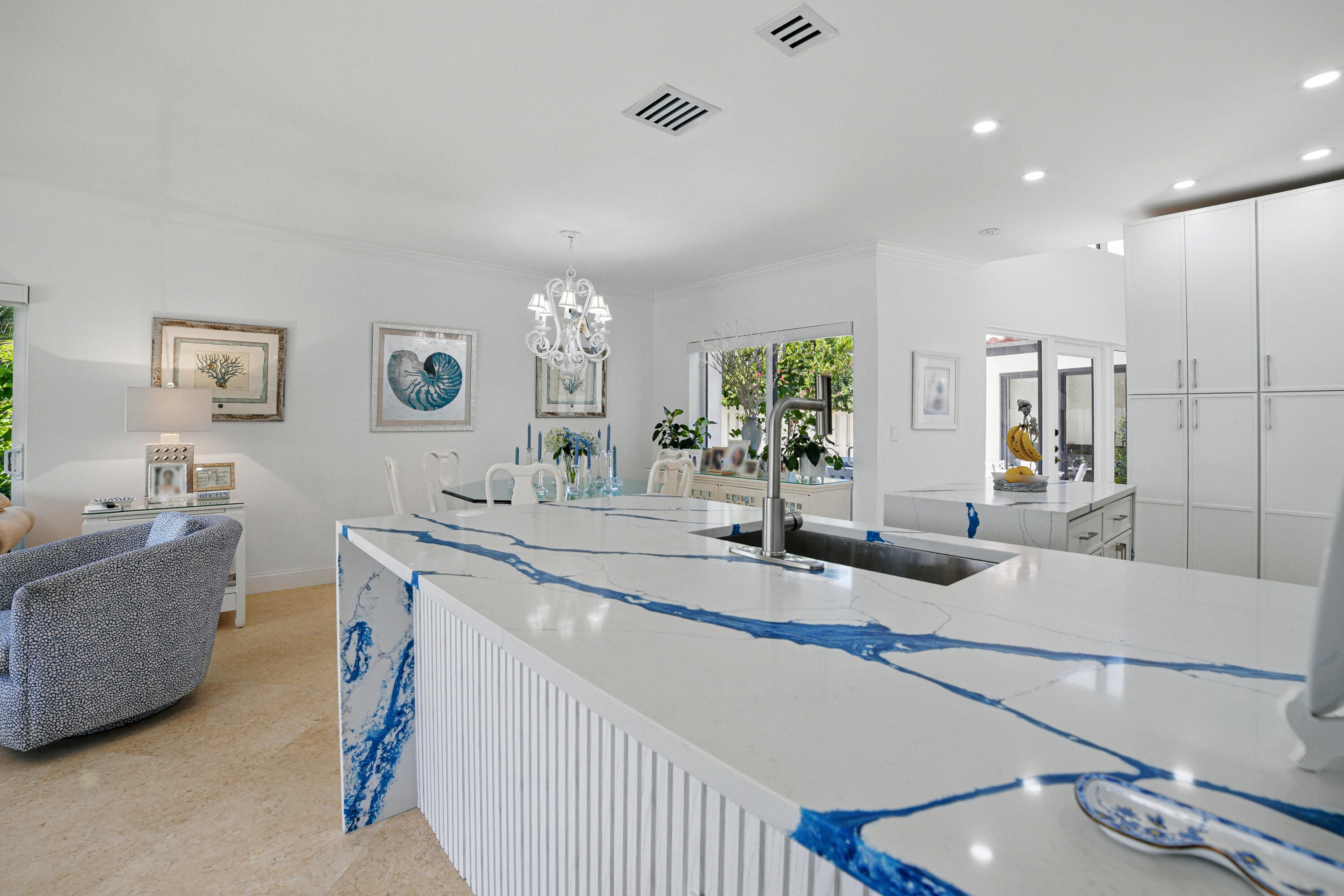 3474 South Ocean Boulevard, Unit 14 Palm Beach, FL 33480 - Photo 9 of 64 a living room with stainless steel appliances furniture a rug and a view of kitchen