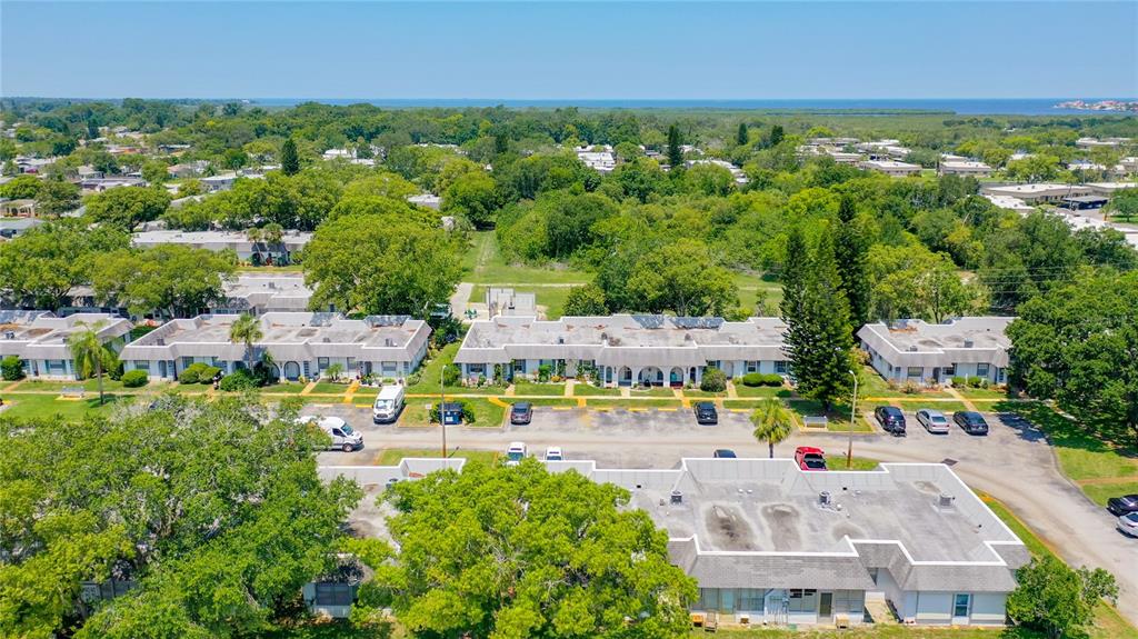 4230 Redcliff Place, Unit 4230 New Port Richey, FL 34652 - Photo 37 of 42 an aerial view of residential houses with outdoor space and swimming pool
