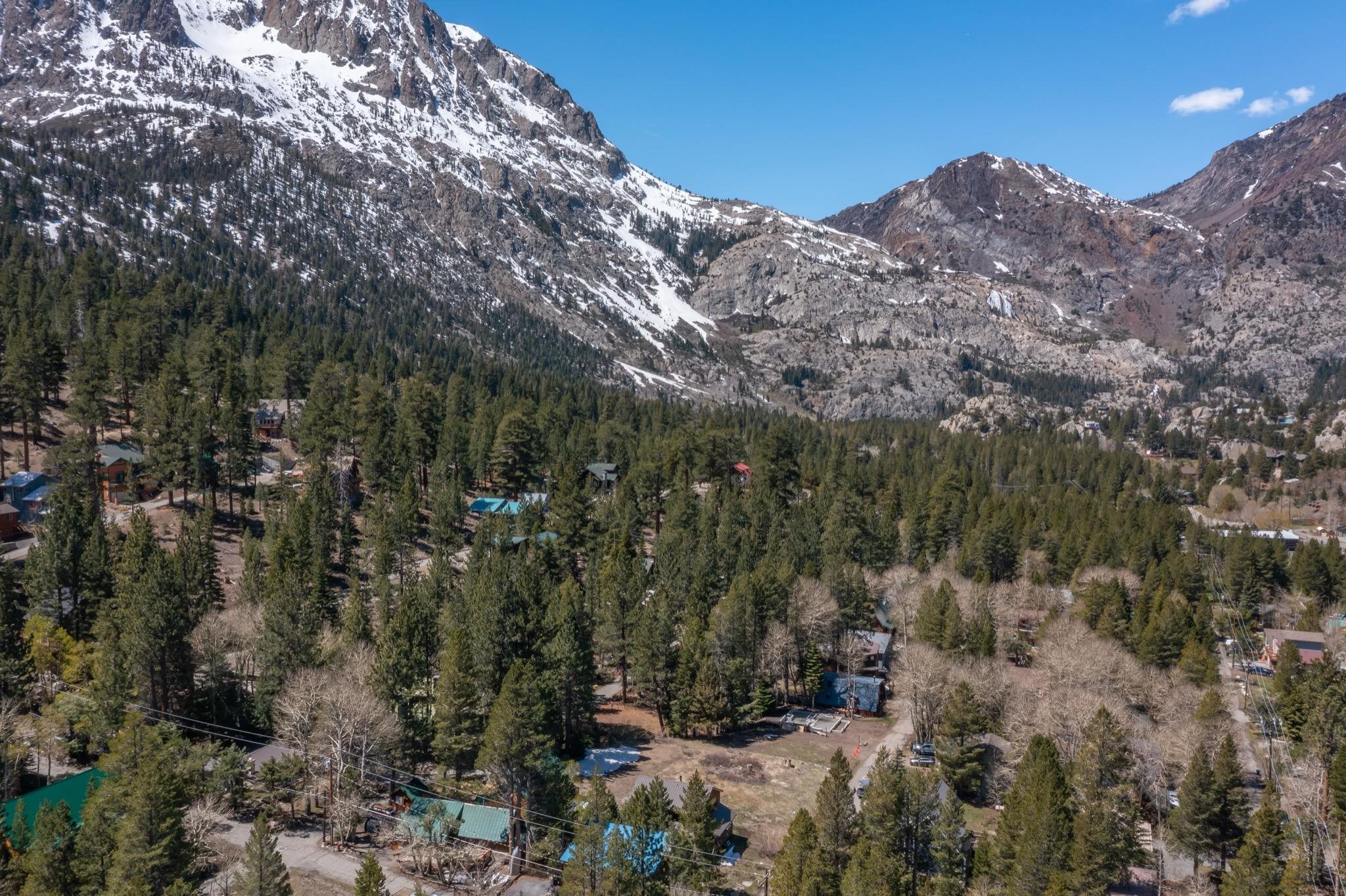 778 Steelhead Road June Lake, CA 93529 - Photo 12 of 16 a view of a building with mountains in the background
