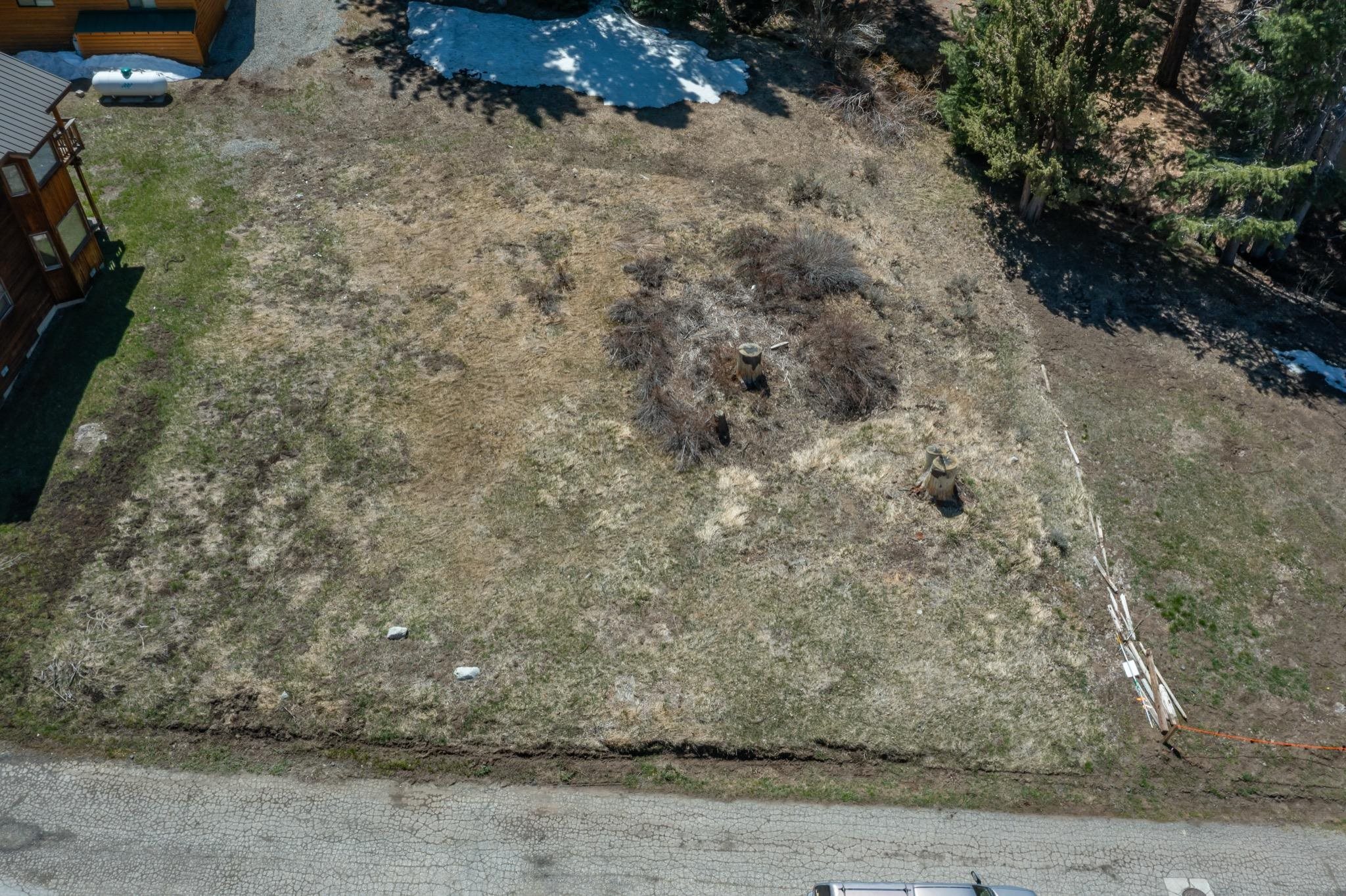 778 Steelhead Road June Lake, CA 93529 - Photo 5 of 16 a view of a dry yard with wooden fence