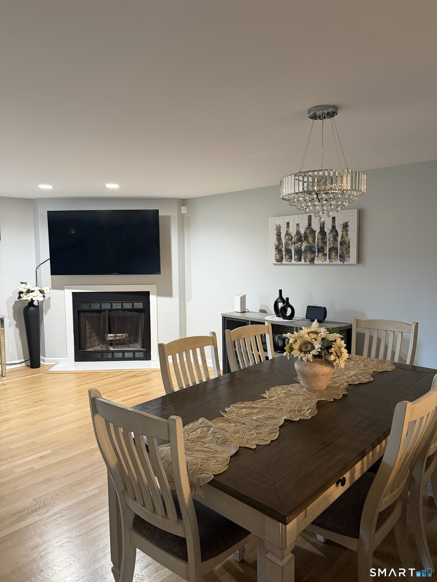 43 Sun Ridge Lane, Unit 43 Cromwell, CT 06416 - Photo 11 of 30 a view of a dining room with furniture and wooden floor