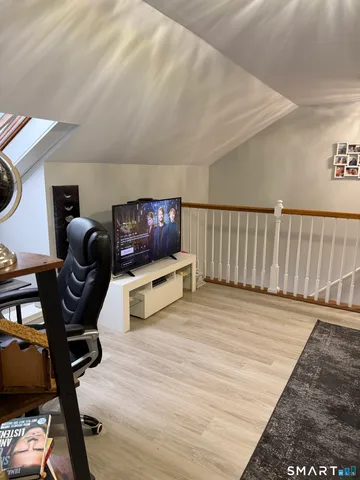 a living room with furniture and a couch