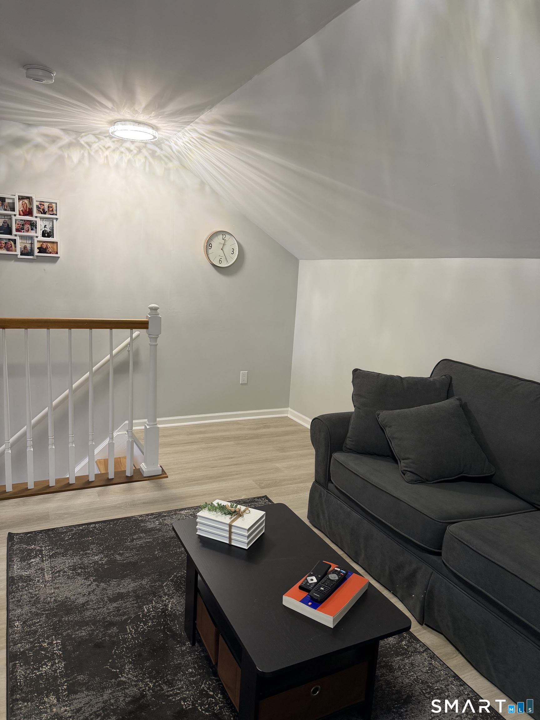 43 Sun Ridge Lane, Unit 43 Cromwell, CT 06416 - Photo 24 of 30 a living room with furniture and a couch