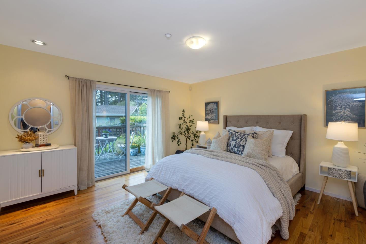 323 Los Altos Drive Aptos, CA 95003 - Photo 13 of 36 a bedroom with a bed and wooden floor