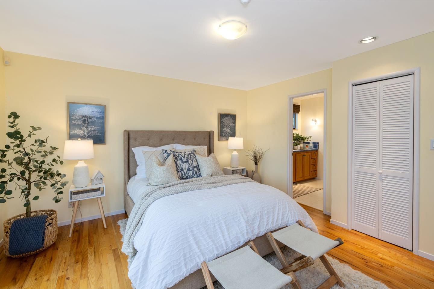 323 Los Altos Drive Aptos, CA 95003 - Photo 14 of 36 a bedroom with a bed and a table in it