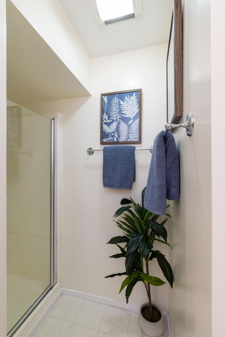 323 Los Altos Drive Aptos, CA 95003 - Photo 16 of 36 a vase of flowers sitting on a floor