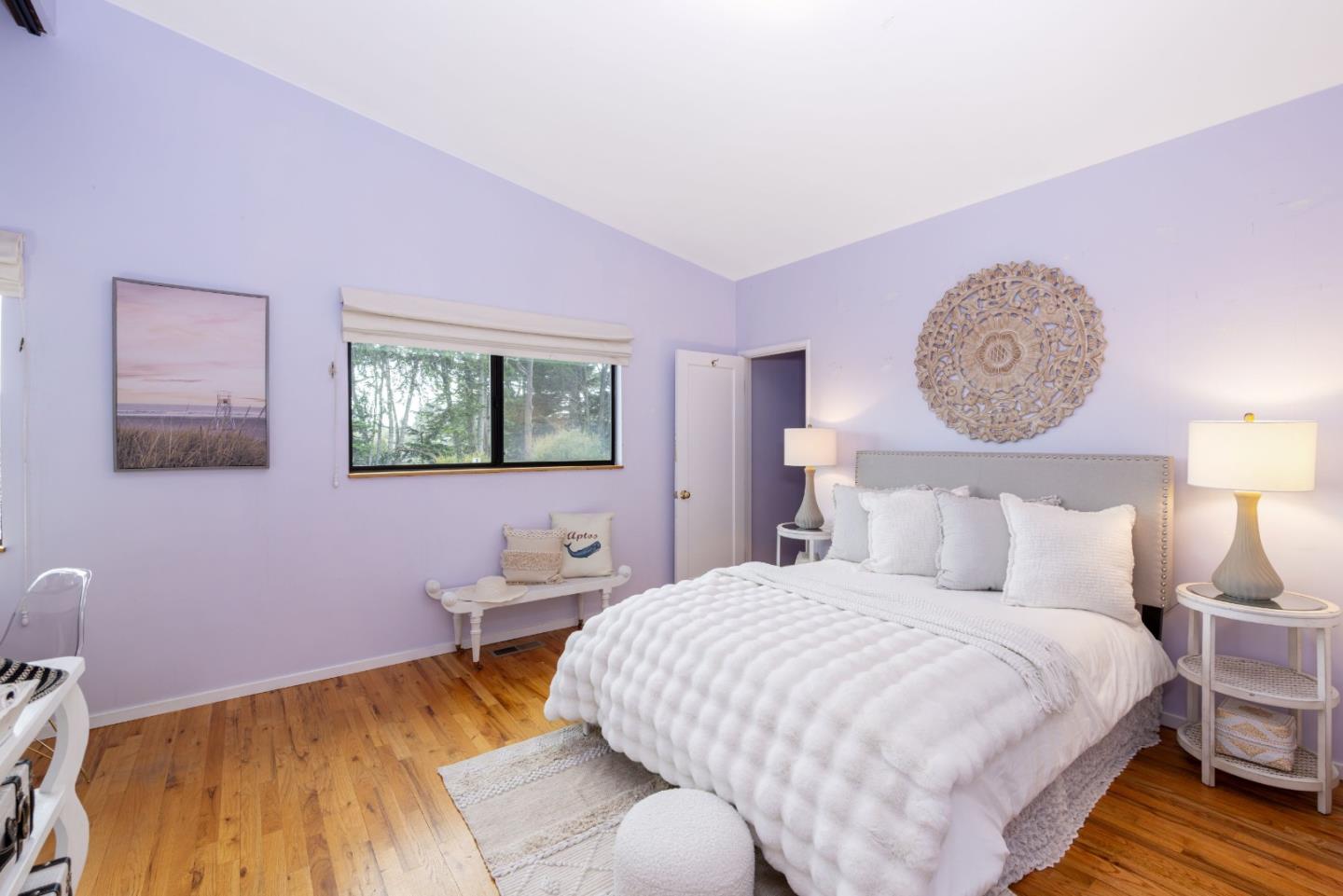 323 Los Altos Drive Aptos, CA 95003 - Photo 19 of 36 a bedroom with a bed and a painting on the wall