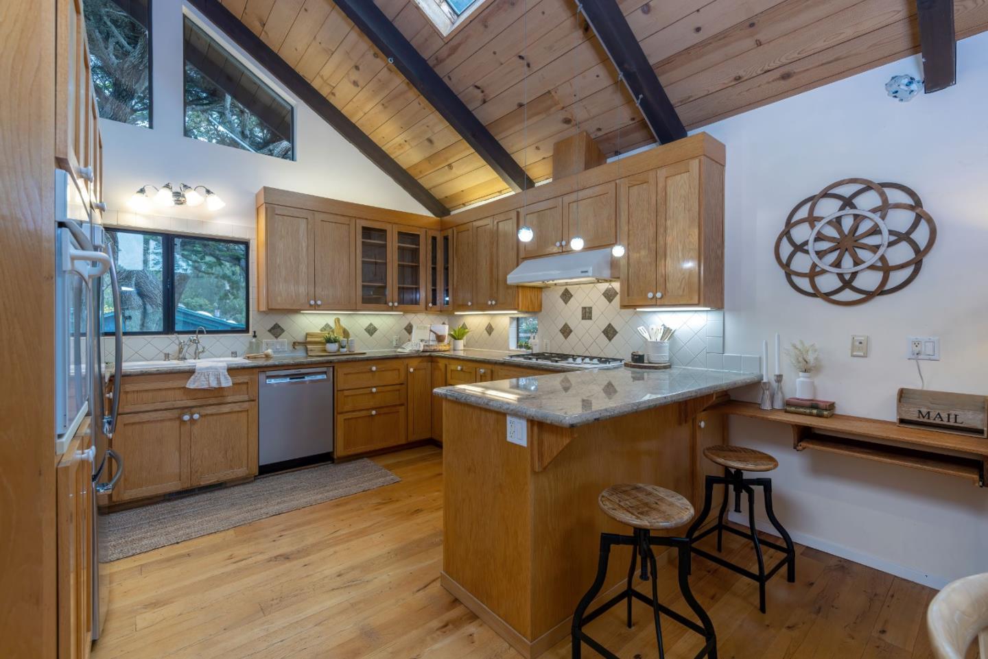 323 Los Altos Drive Aptos, CA 95003 - Photo 9 of 36 a kitchen with a sink cabinets and wooden floor