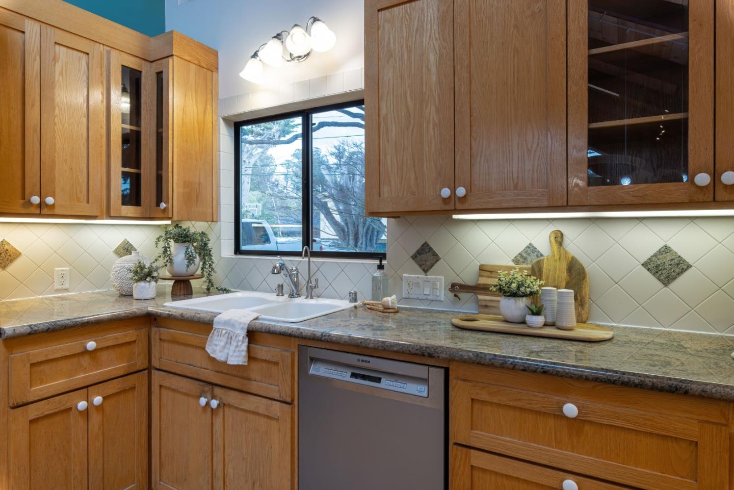 323 Los Altos Drive Aptos, CA 95003 - Photo 10 of 36 a kitchen with granite countertop a sink and a stove
