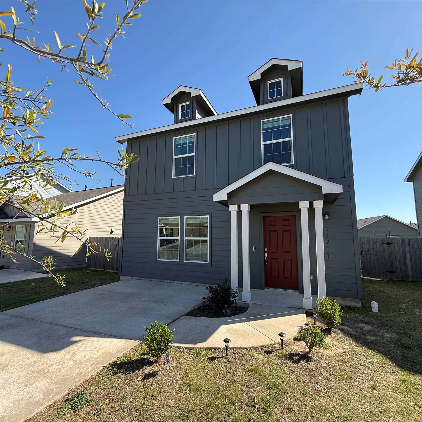 13711 Mussel Run Elgin, TX 78621 - Photo 13 of 31 View of front facade featuring board and batten siding