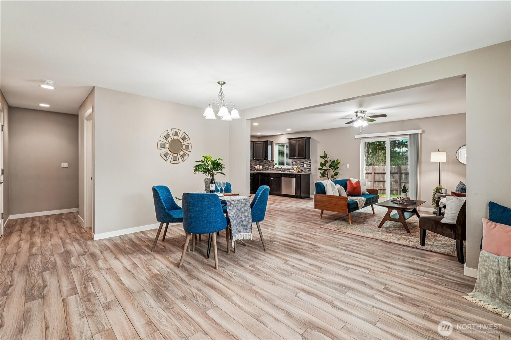 741 Northeast Larson Boulevard Belfair, WA 98528 - Photo 12 of 32 a living room with furniture and a wooden floor