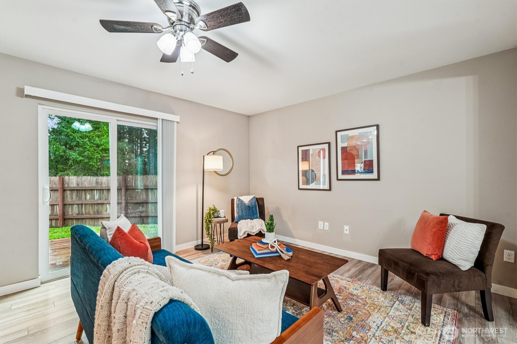 741 Northeast Larson Boulevard Belfair, WA 98528 - Photo 17 of 32 a living room with furniture and a large window