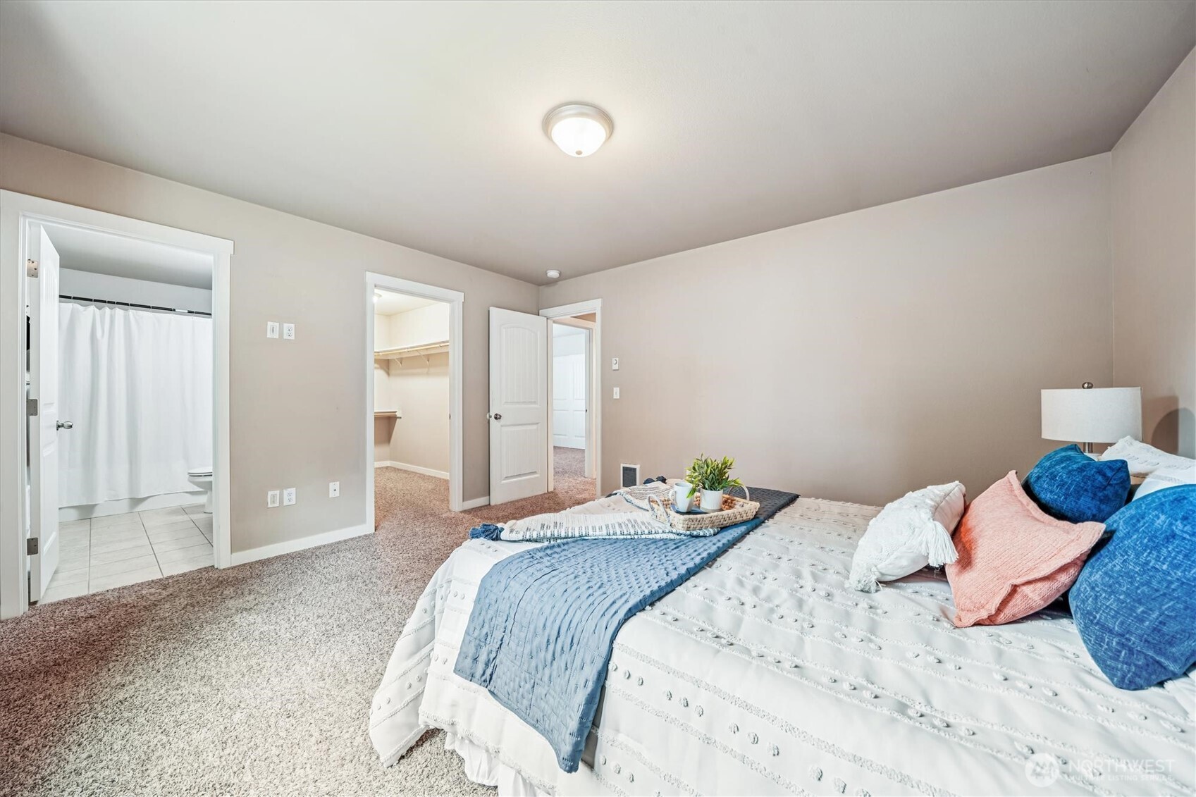 741 Northeast Larson Boulevard Belfair, WA 98528 - Photo 22 of 32 a bedroom with a bed and a window