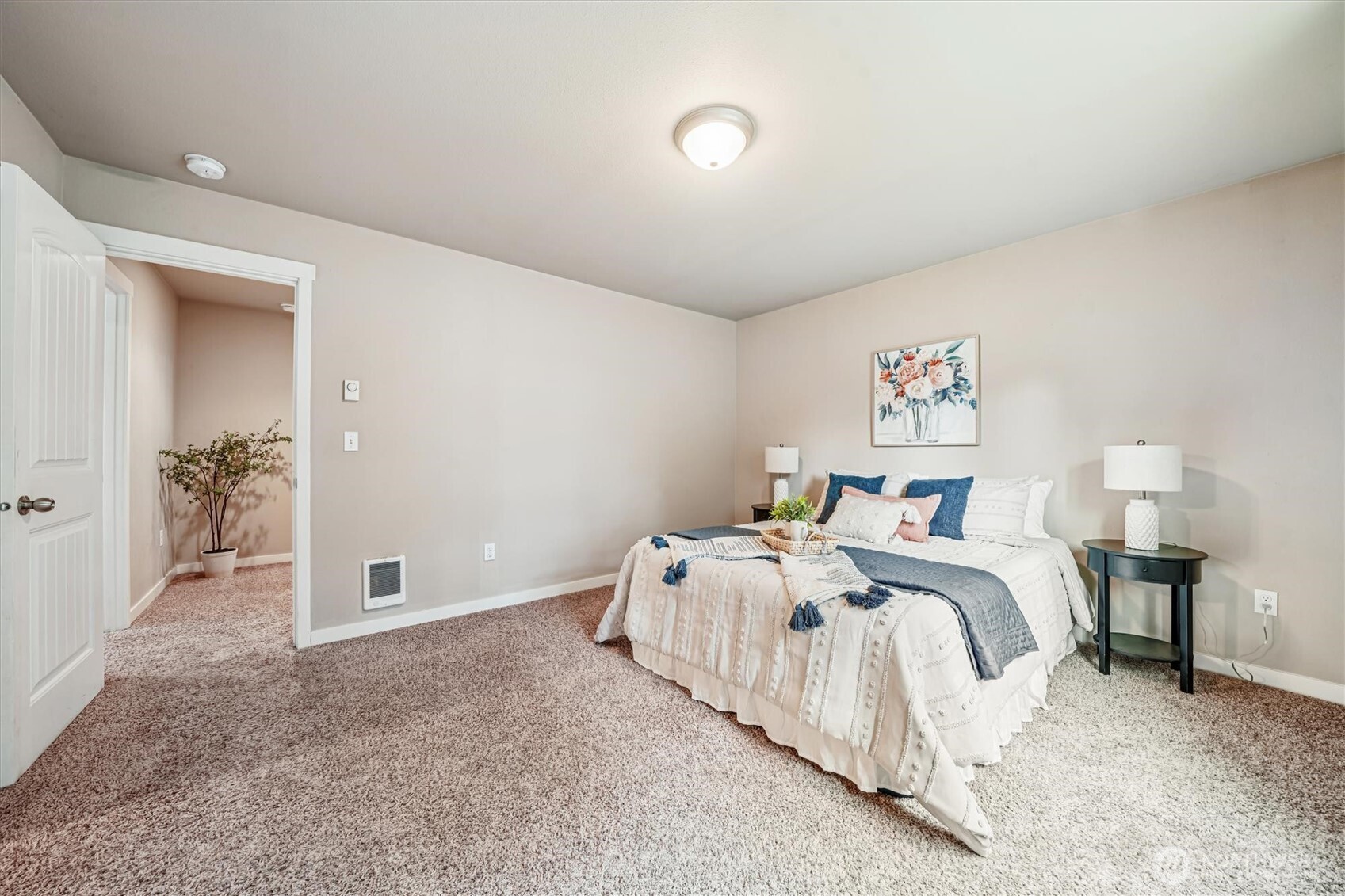 741 Northeast Larson Boulevard Belfair, WA 98528 - Photo 24 of 32 a bed room with a bed and a night stand