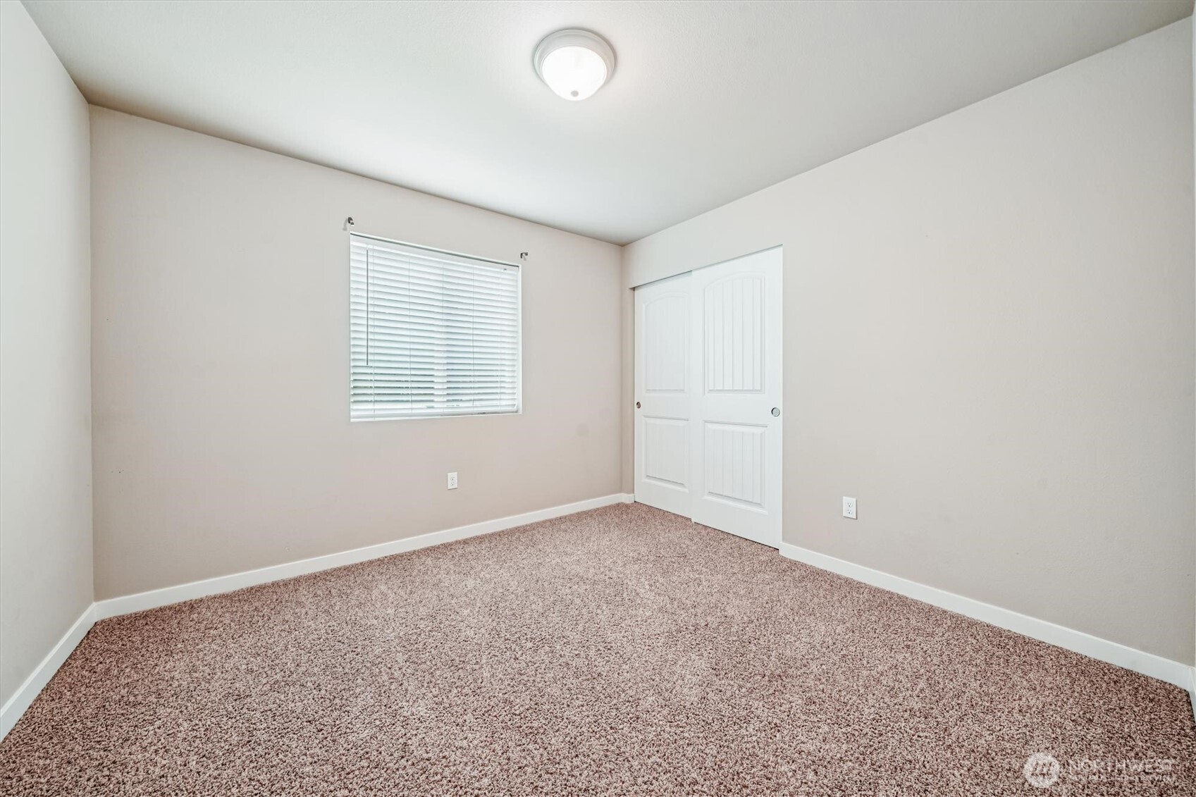 741 Northeast Larson Boulevard Belfair, WA 98528 - Photo 27 of 32 an empty room with windows