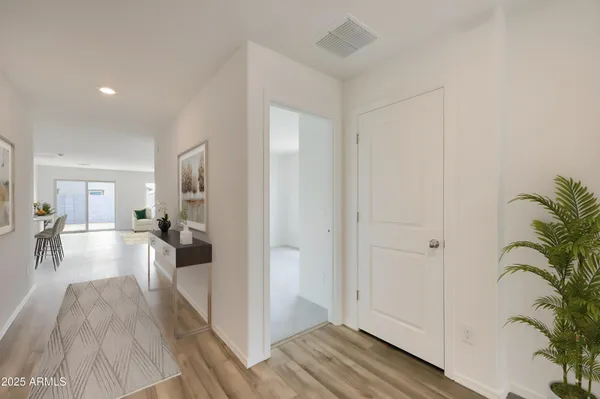a view of a living room and hardwood floor