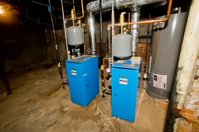a view of living room with a refrigerator and washer