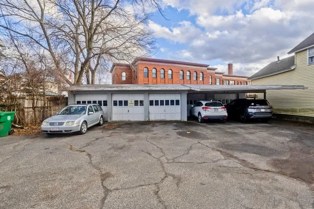 an aerial view of houses with outdoor space