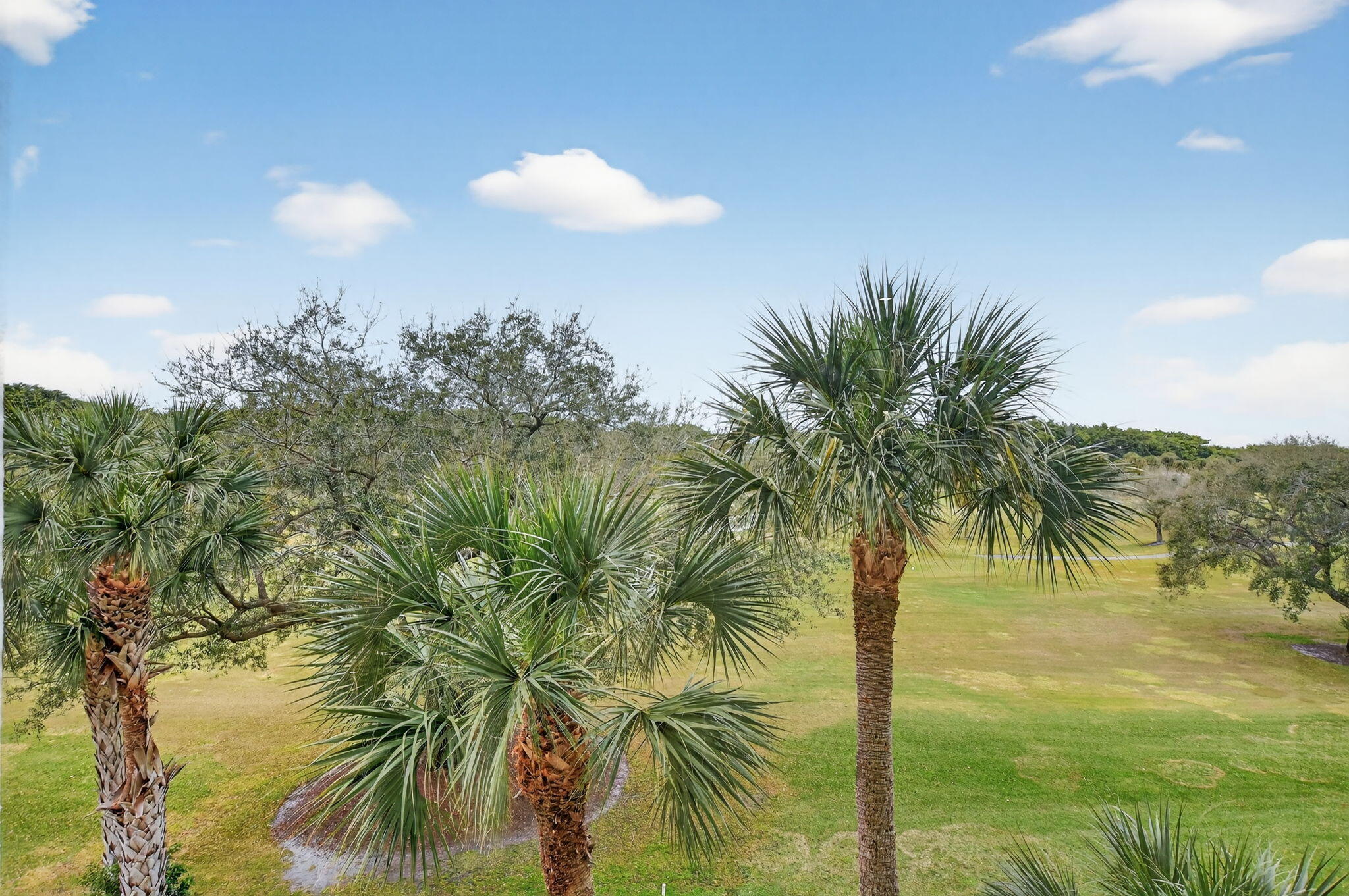 7835 Lakeside Boulevard, Unit 946 Boca Raton, FL 33434 - Photo 19 of 20 a view of a lake and a yard