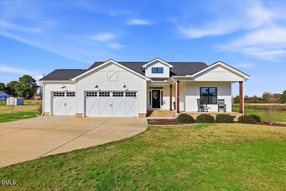 2249 Brogden Road Smithfield, NC 27577 - Photo 1 of 30 a front view of a house with garden