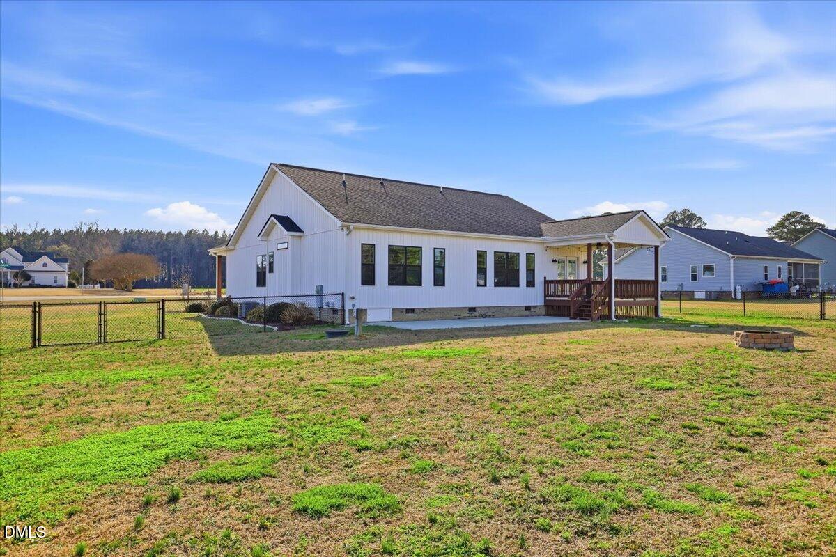 2249 Brogden Road Smithfield, NC 27577 - Photo 29 of 30 a view of a house with a big yard