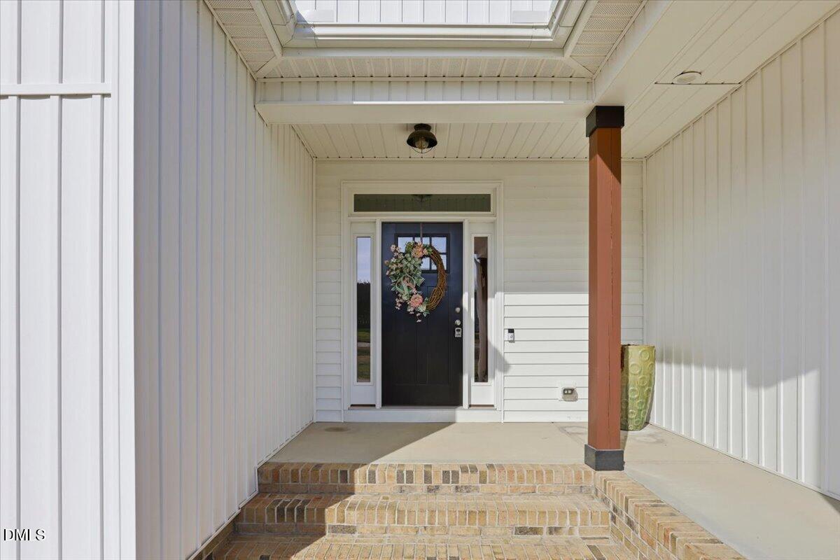 2249 Brogden Road Smithfield, NC 27577 - Photo 4 of 30 a view of a entryway door of the house