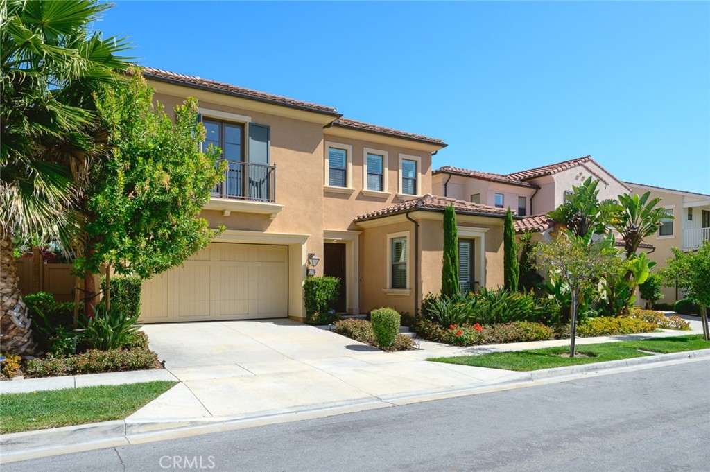 108 Henderson Irvine, CA 92620 - Photo 2 of 37 a front view of a house with a yard and garage