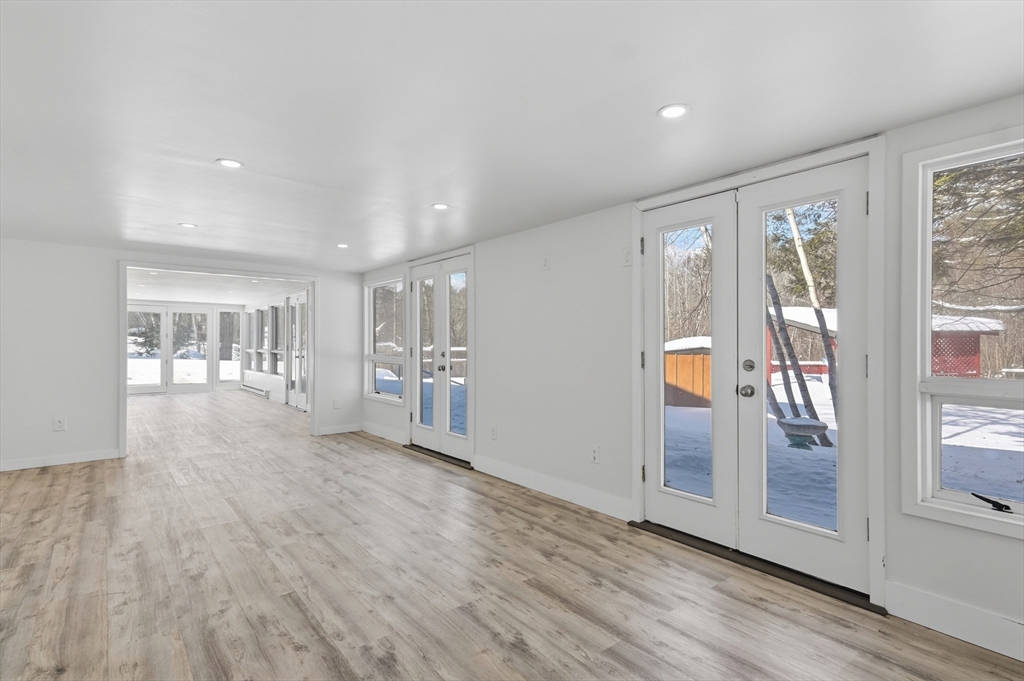 1081 Lowell Road Groton, MA 01450 - Photo 25 of 42 a view of entryway with wooden floor