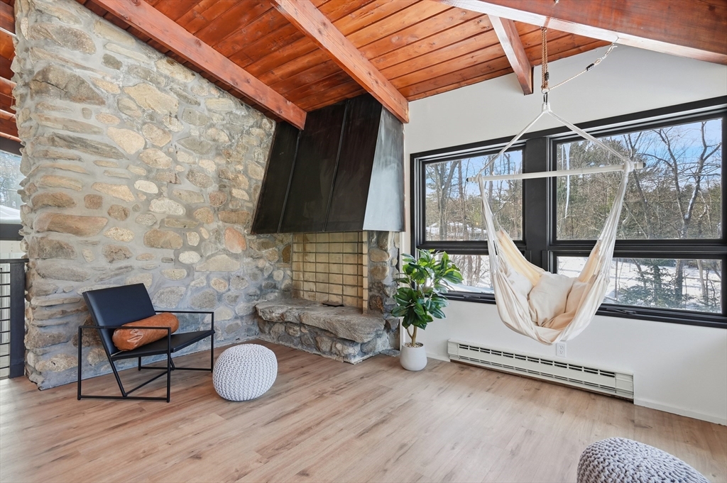 1081 Lowell Road Groton, MA 01450 - Photo 8 of 42 a view of a chairs and tables in the patio