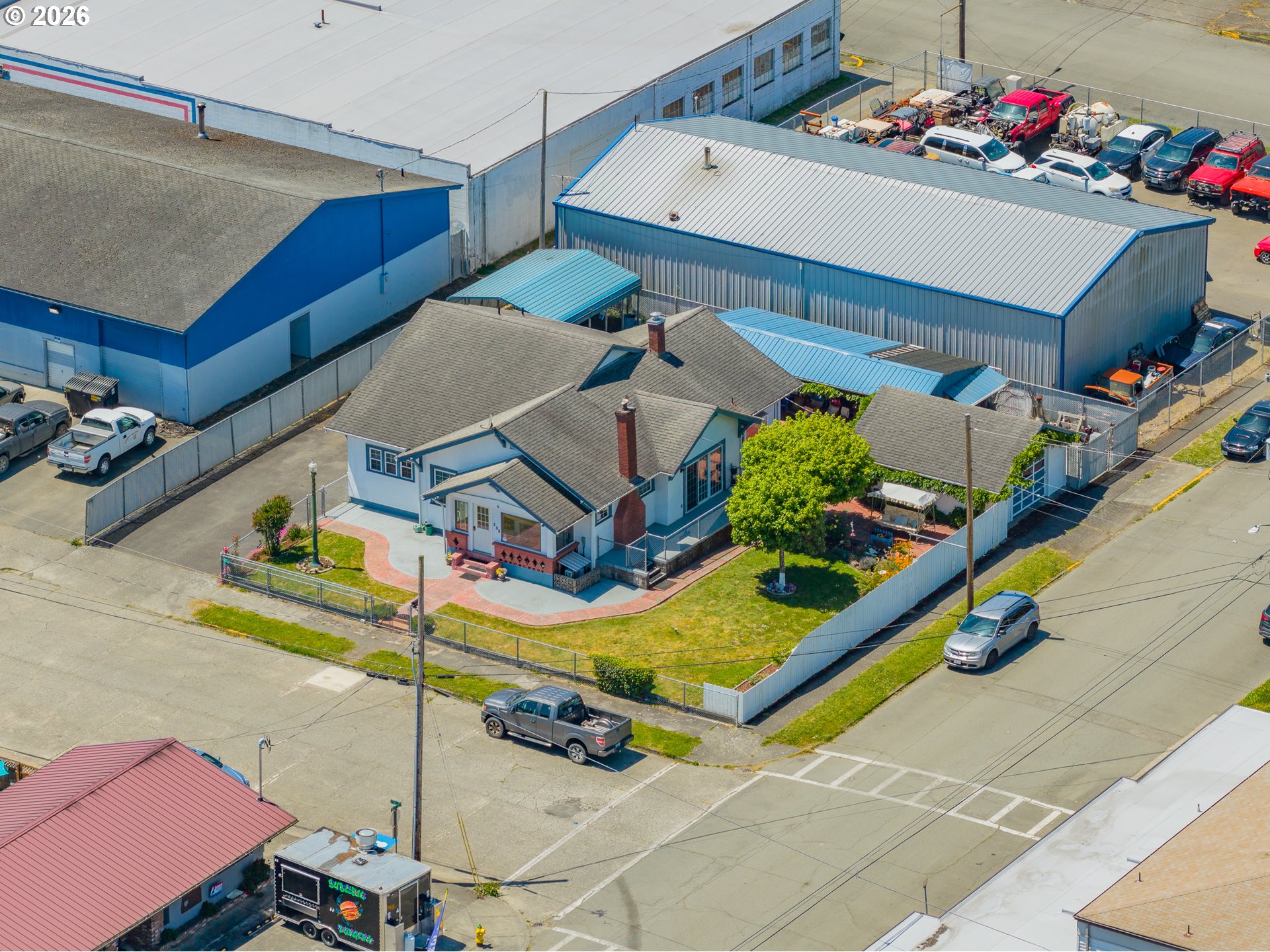 208 7th Street Myrtle Point, OR 97458 - Photo 47 of 48 a aerial view of a house with a garden