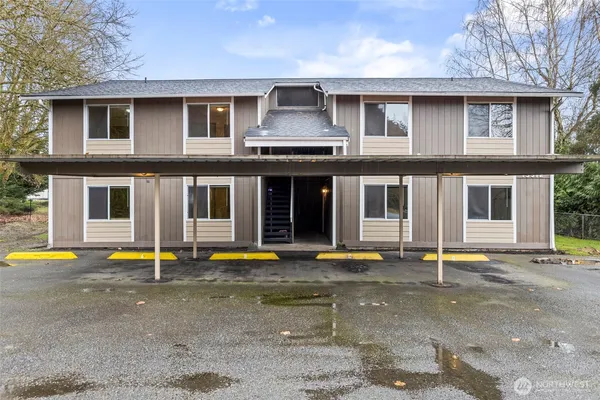 a front view of a house with a swimming pool