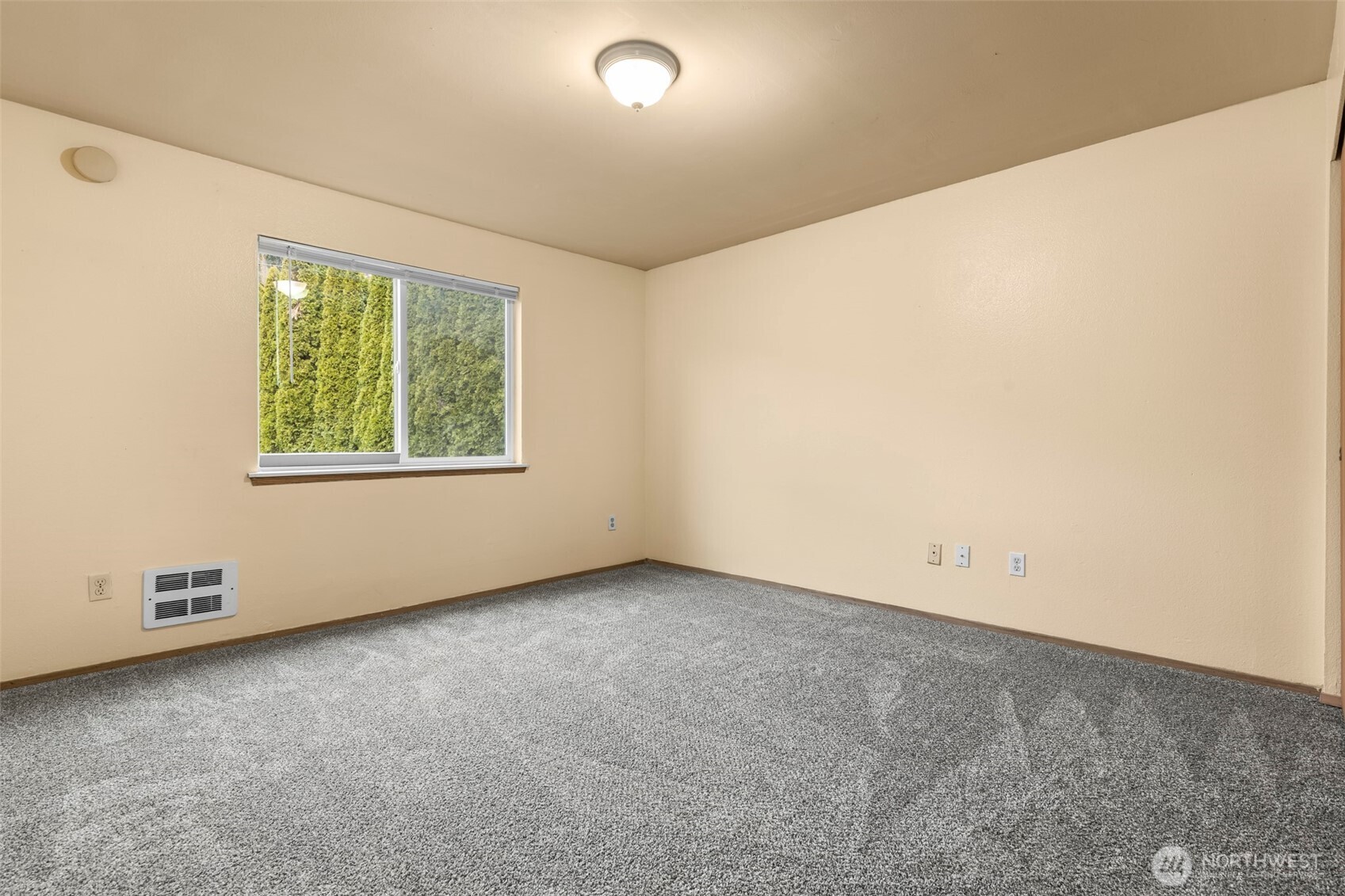 15912 Elm Street East Sumner, WA 98390 - Photo 14 of 30 an empty room with a window