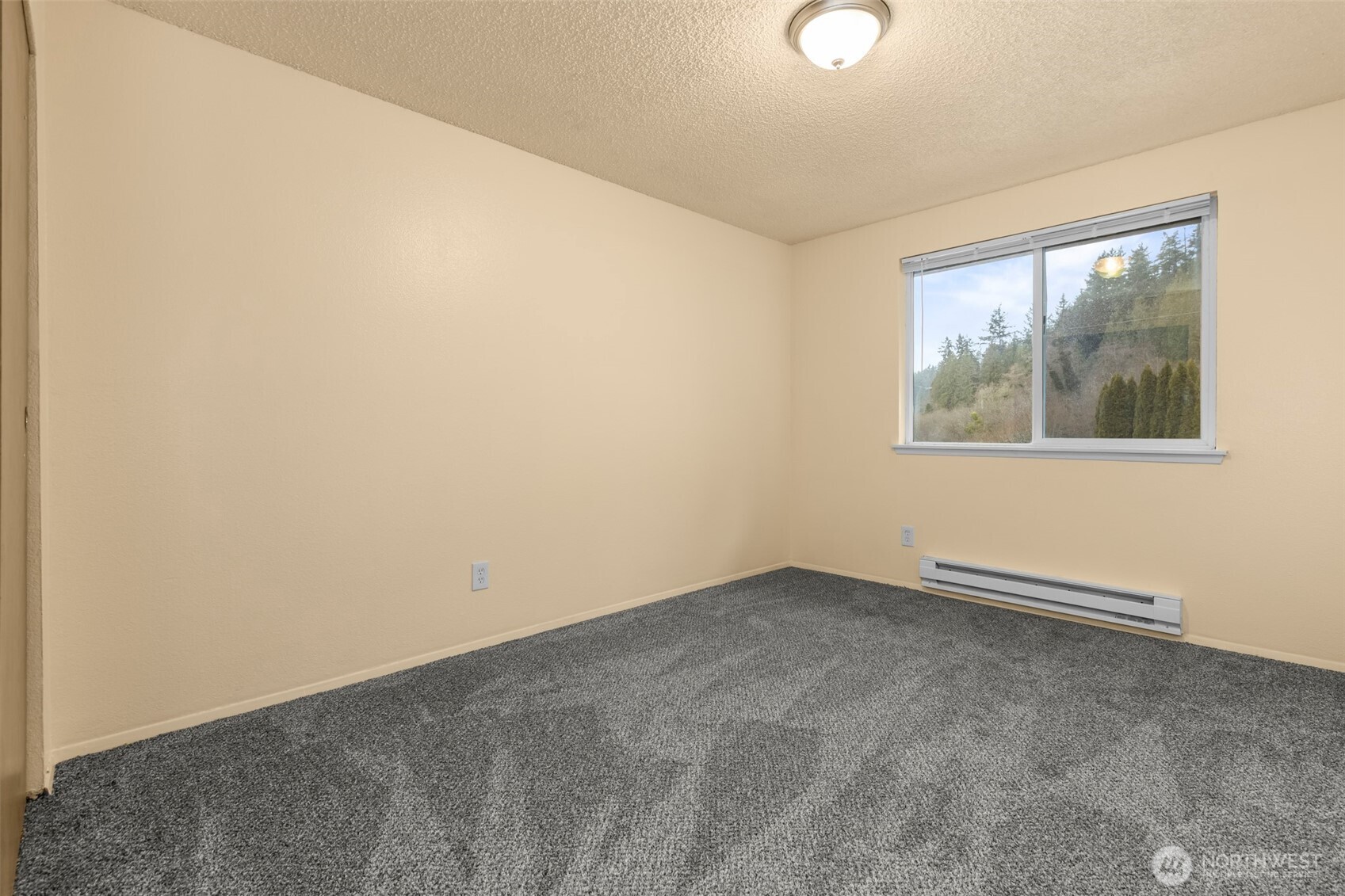 15912 Elm Street East Sumner, WA 98390 - Photo 17 of 30 an empty room with a window