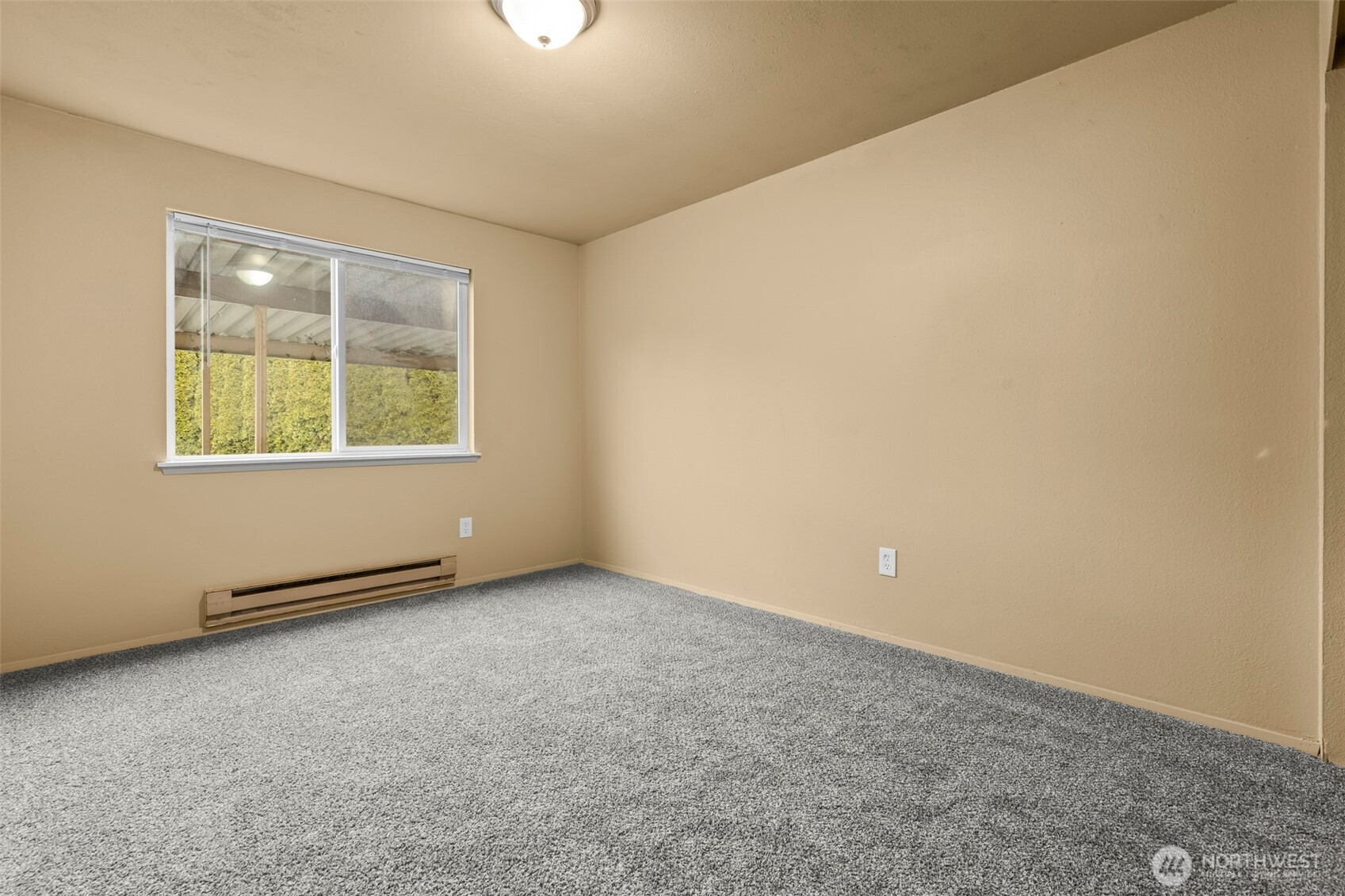 15912 Elm Street East Sumner, WA 98390 - Photo 18 of 30 an empty room with a window