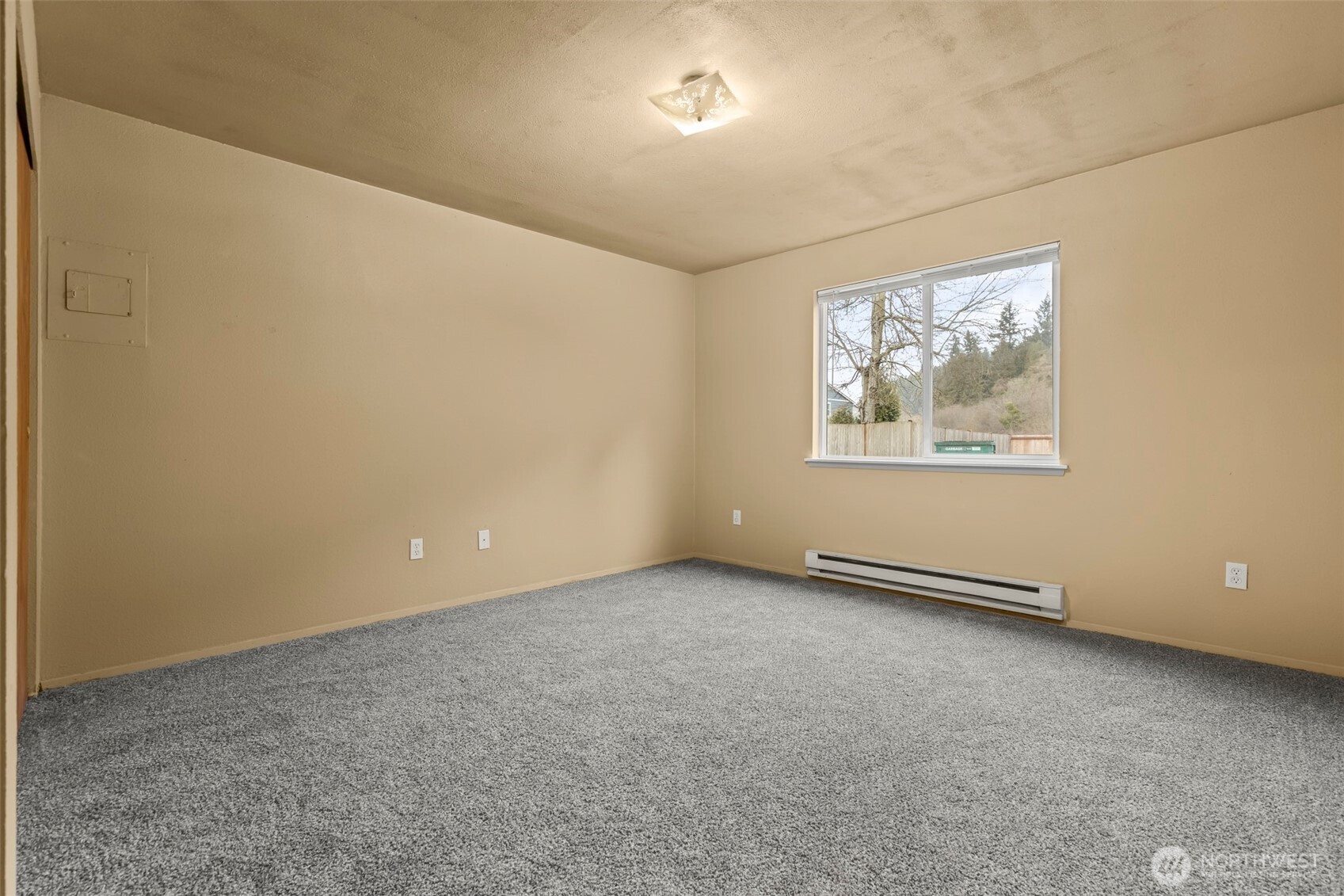15912 Elm Street East Sumner, WA 98390 - Photo 19 of 30 an empty room with windows