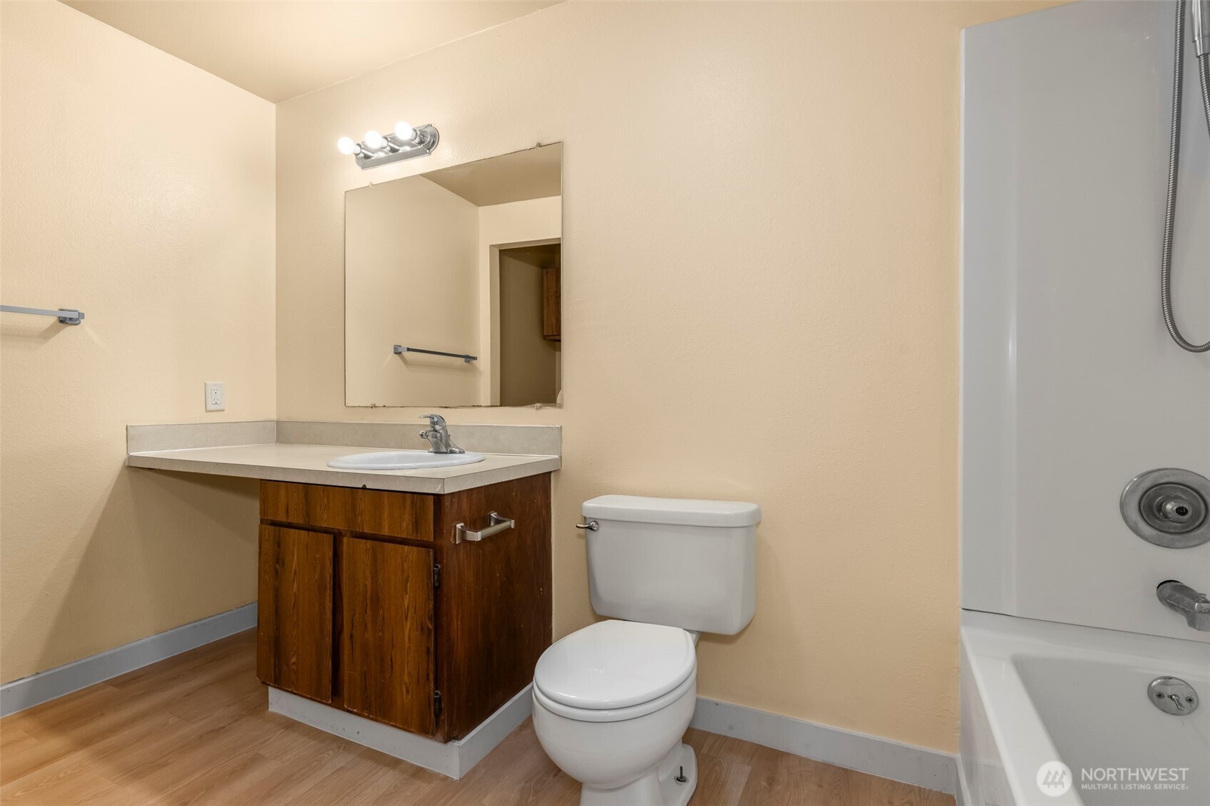 15912 Elm Street East Sumner, WA 98390 - Photo 20 of 30 a bathroom with a toilet sink and mirror