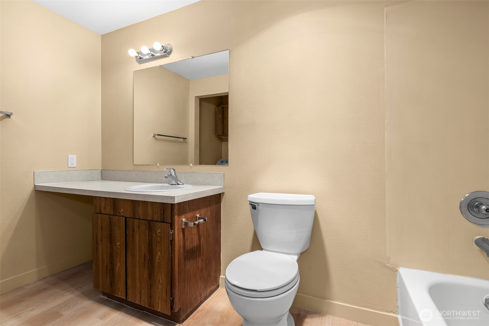 15912 Elm Street East Sumner, WA 98390 - Photo 22 of 30 a bathroom with a sink and a toilet