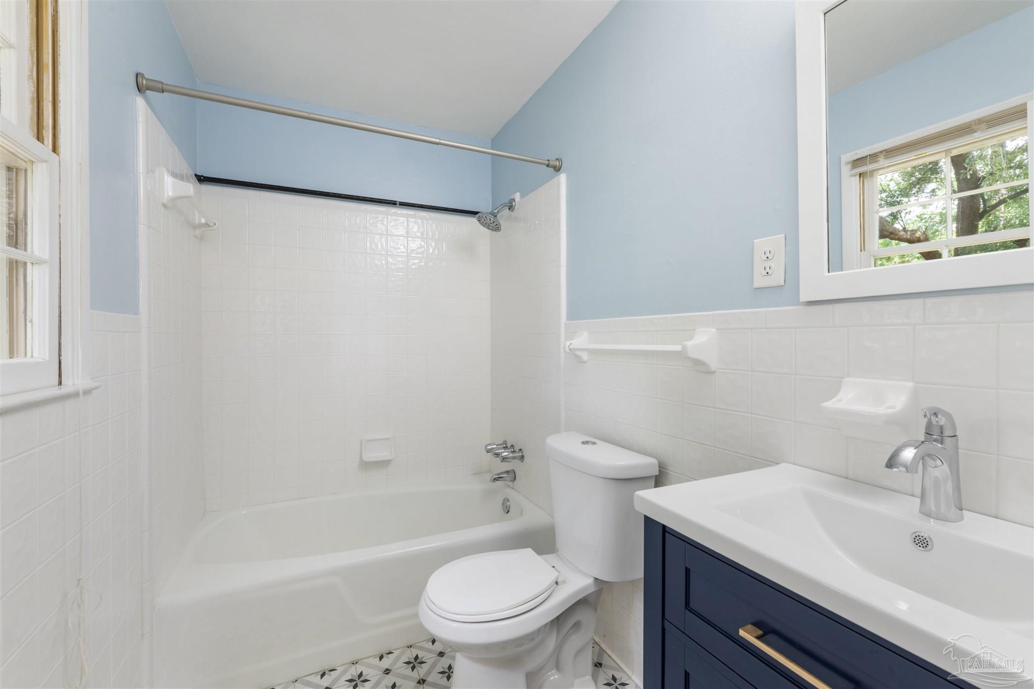 2045 Summit Boulevard Pensacola, FL 32503 - Photo 15 of 23 a bathroom with a sink toilet and shower