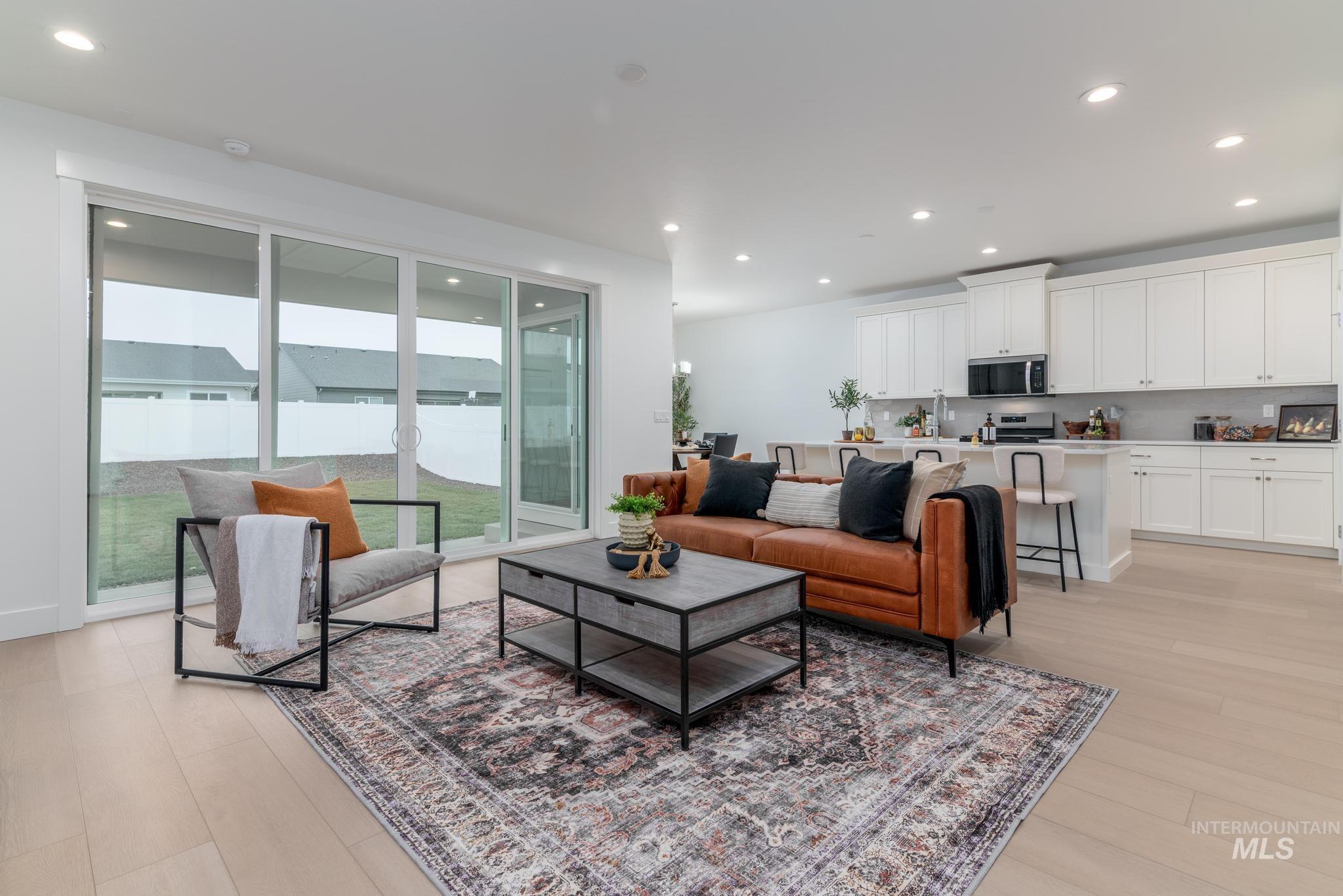1907 West Blue Lightning Street Middleton, ID 83644 - Photo 2 of 11 Living room with recessed lighting and light wood-style flooring