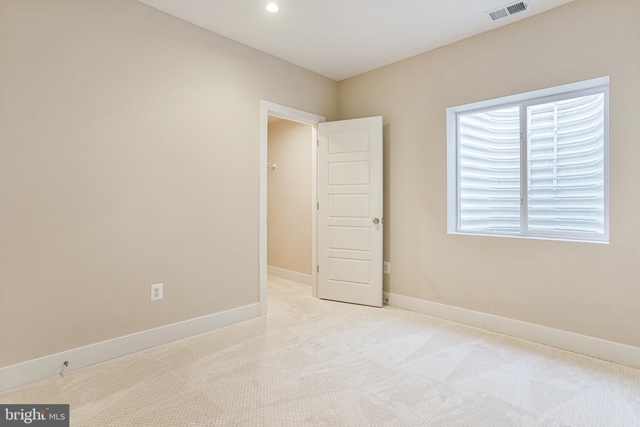 4996 Ilchester Road Ellicott City, MD 21043 - Photo 65 of 74 an empty room with windows
