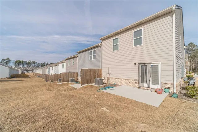 a view of a house with a patio