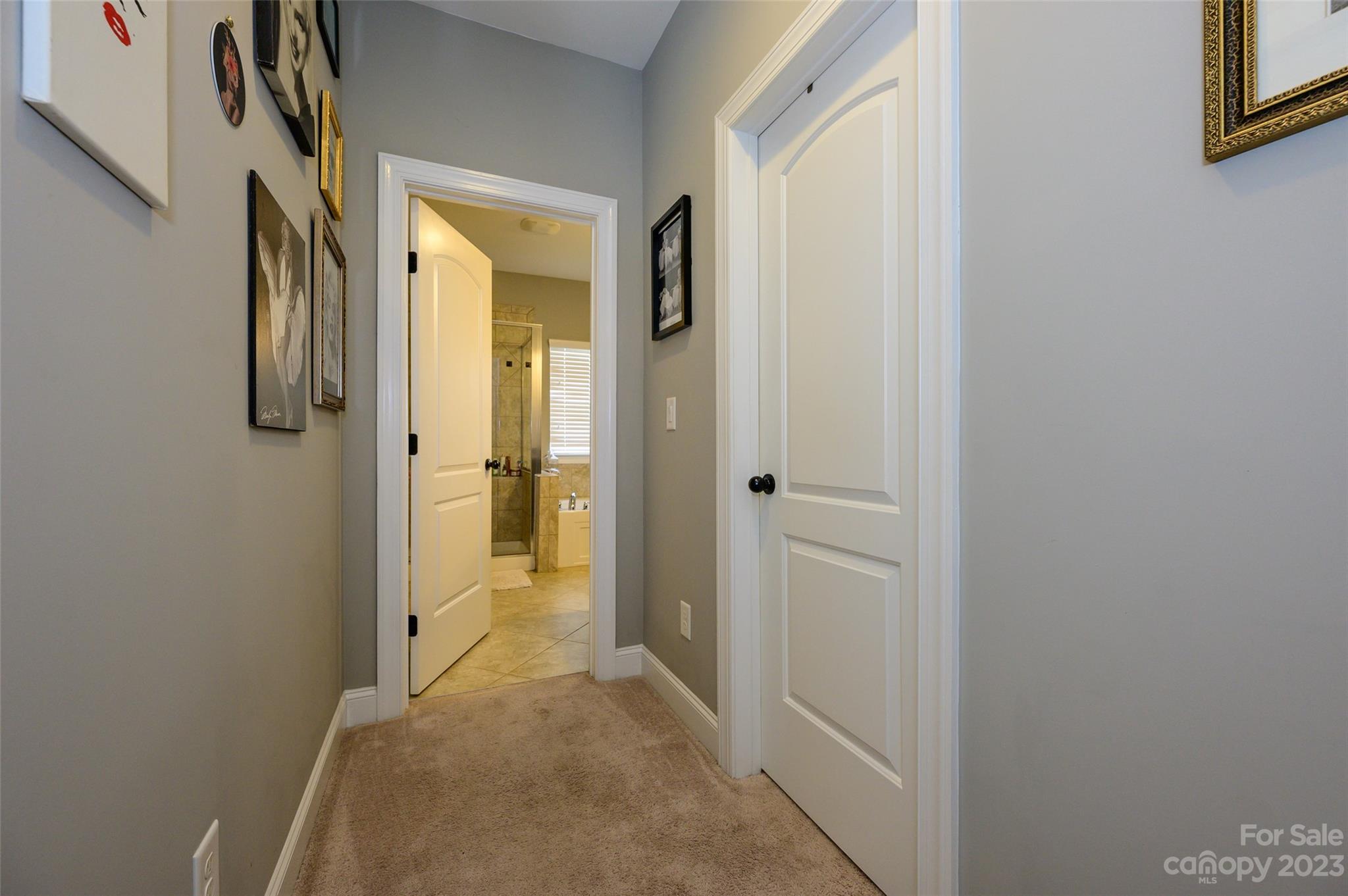 3317 Lucy Drive Monroe, NC 28110 - Photo 22 of 38 a view of a bathroom from a hallway