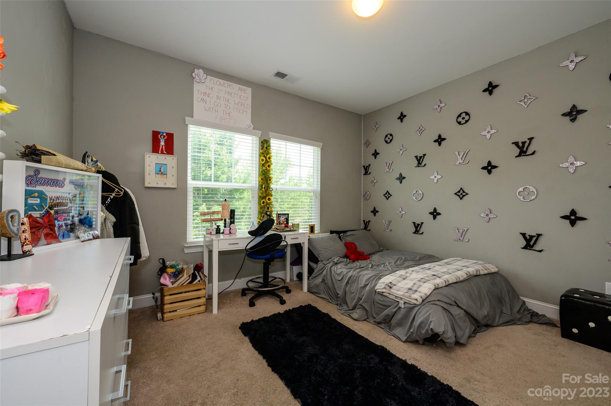 3317 Lucy Drive Monroe, NC 28110 - Photo 28 of 38 a bedroom with a bed and a window
