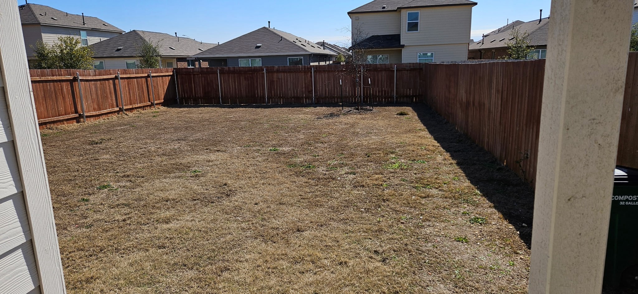 215 Canley Loop Hutto, TX 78634 - Photo 13 of 13 Fenced backyard featuring a residential view